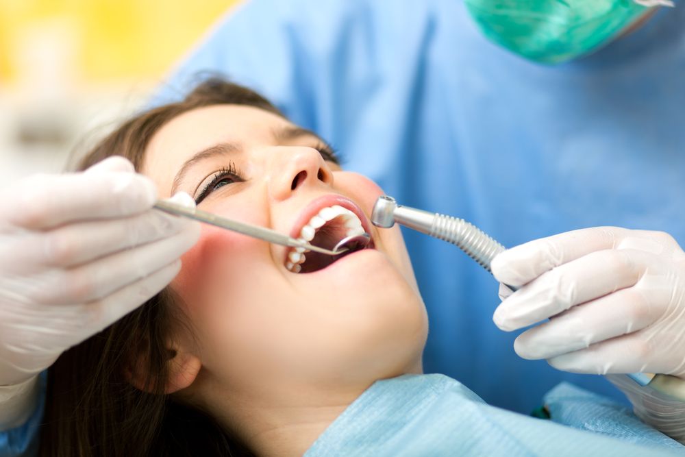happy patient in dental clinic