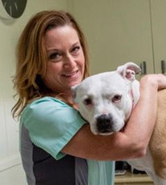 Dr. Angela Smith with her rescue bit bull Hope.