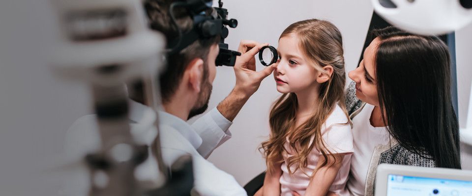 Girl getting an eye exam