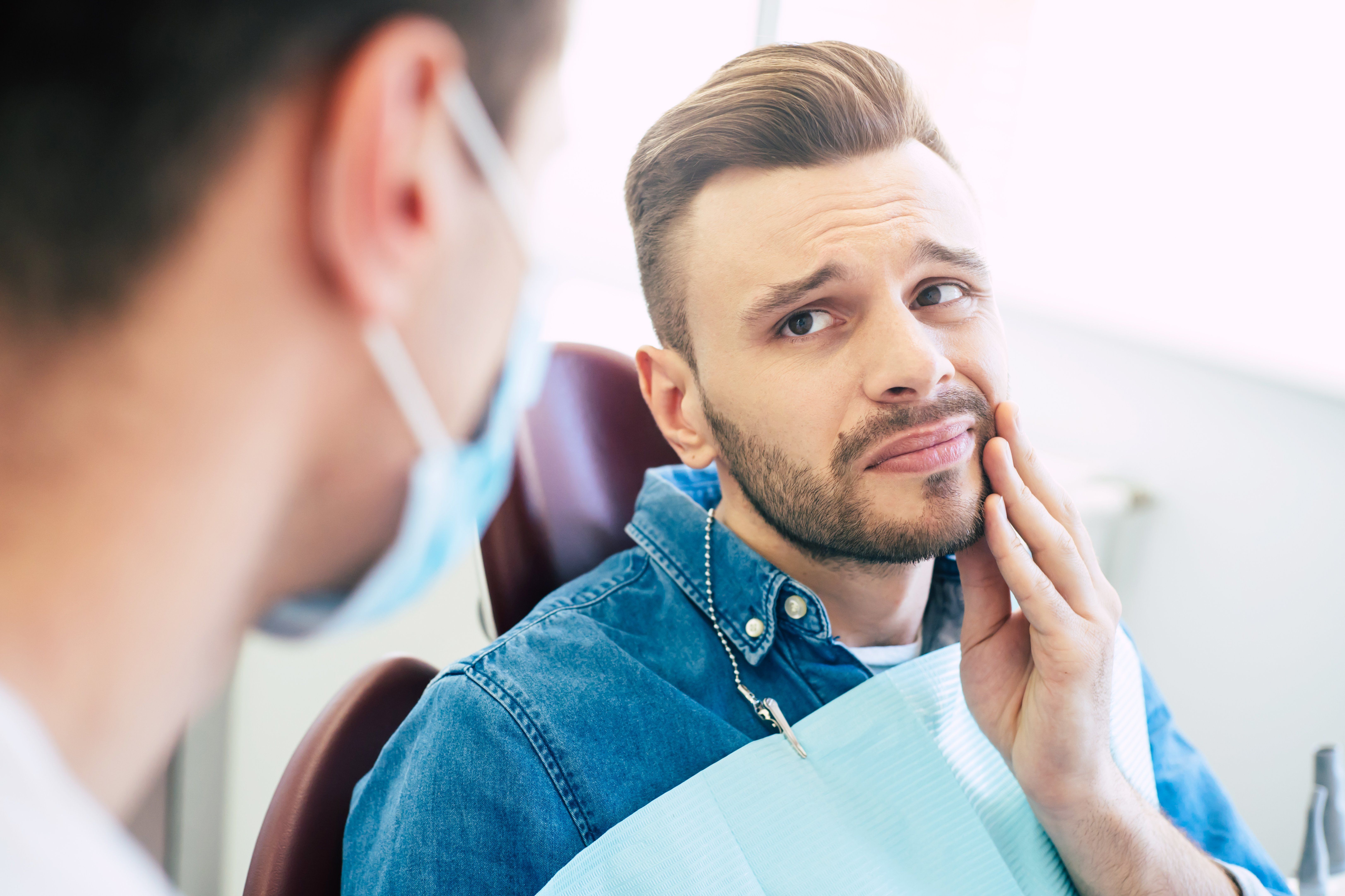 man with tooth pain 