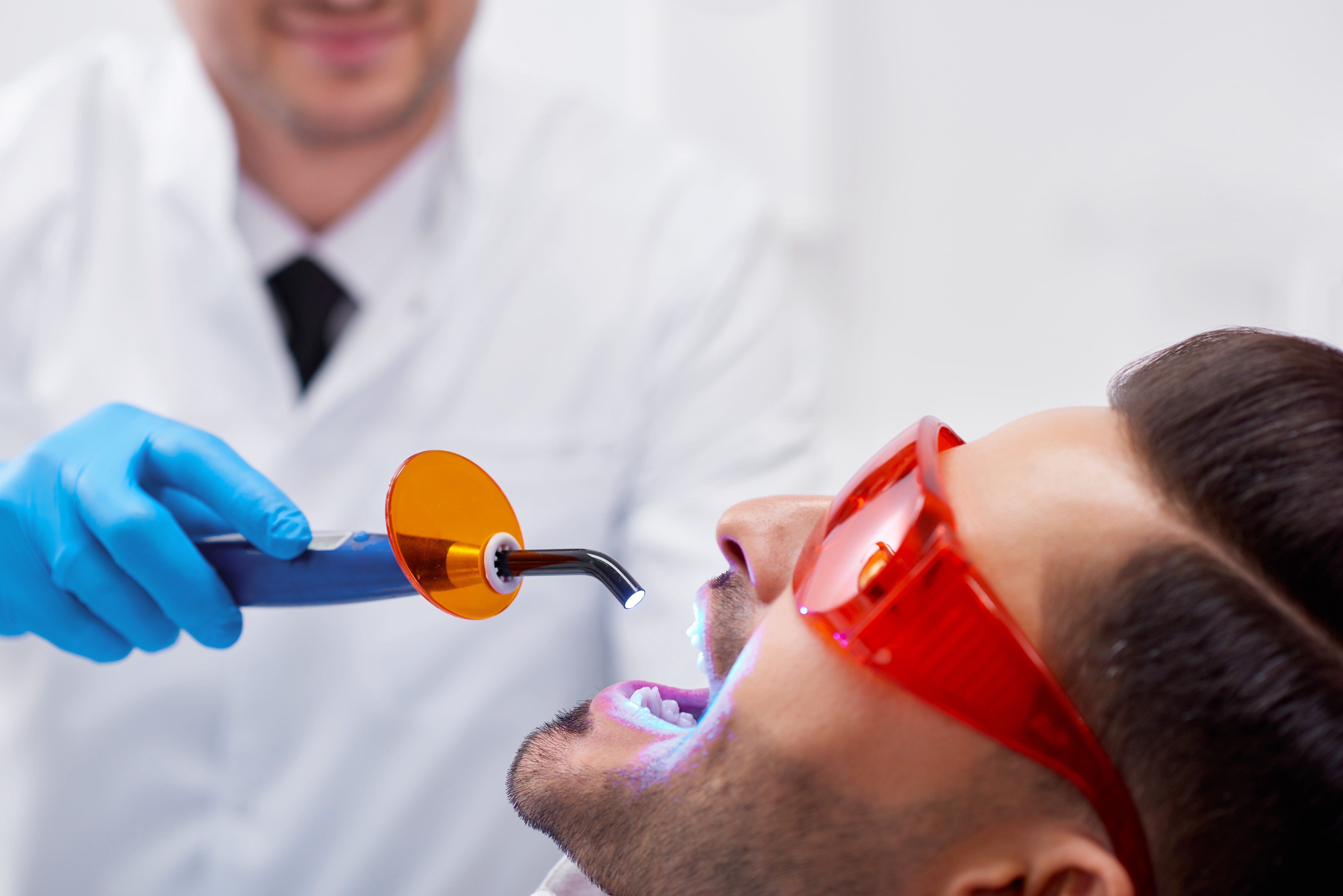 man getting tooth filling