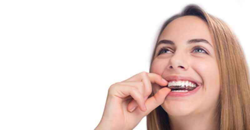 PATIENTS IN LAS VEGAS, NV ASK ABOUT THE ADVANTAGES OF USING INVISALIGN TREATMENT TO REALIGN THE SMILE