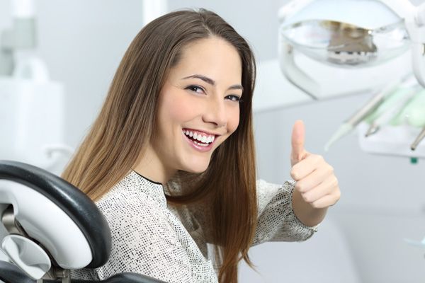 happy woman in a dental clinic