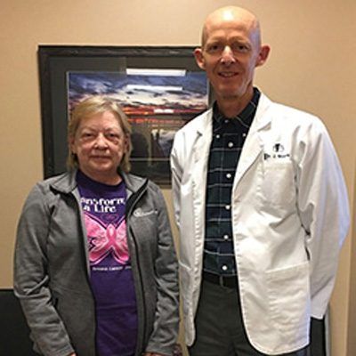 Dr. Moore with patient Arleen J