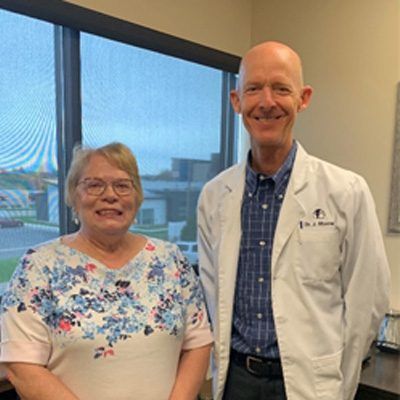 Dr. Moore with patient Cheryl H.
