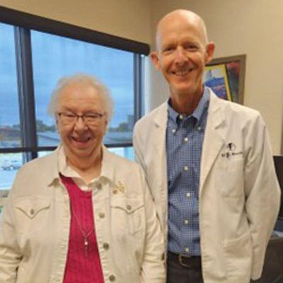 Dr. Moore with patient Donna R.