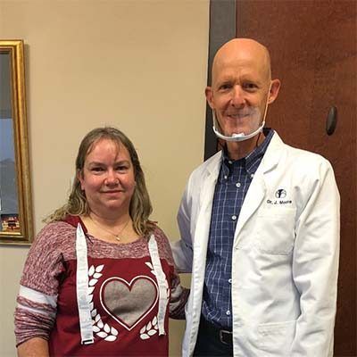 Dr. Moore with patient Peggy W.