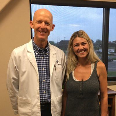 Dr. Moore with patient Sydney O.