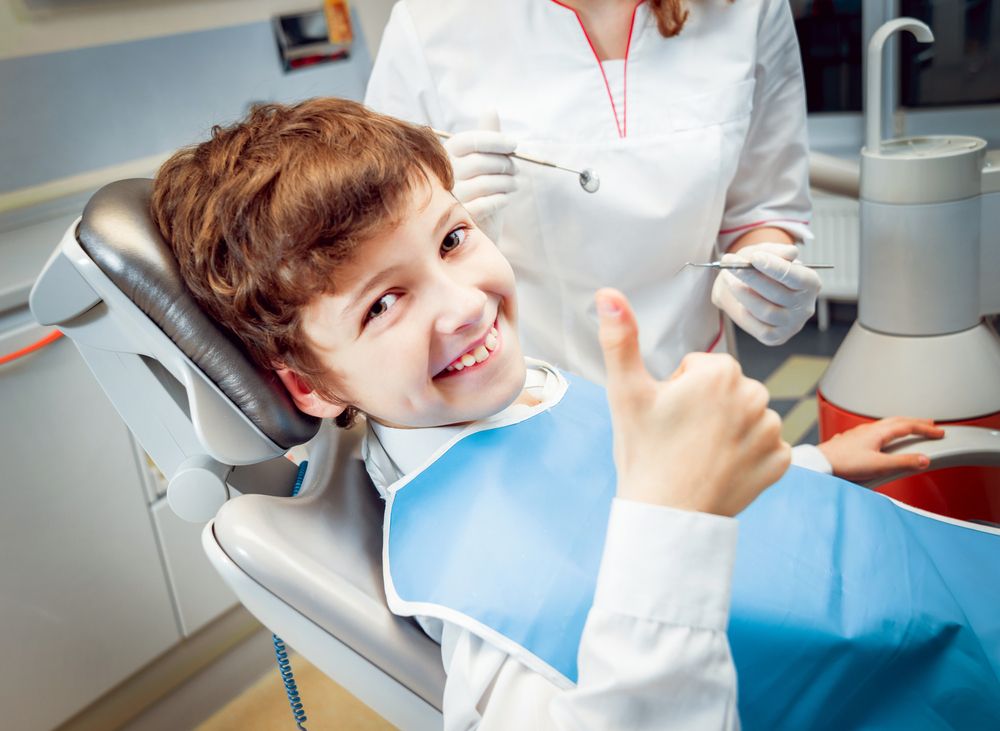 happy kid in a dental clinic