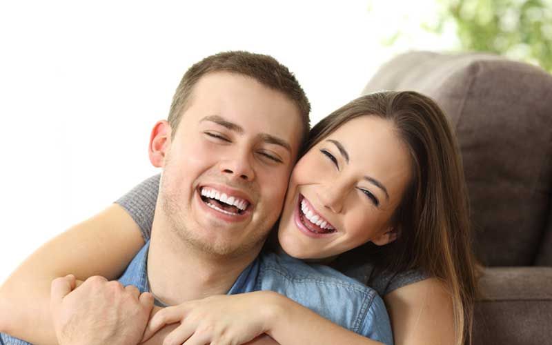 young couple smiling
