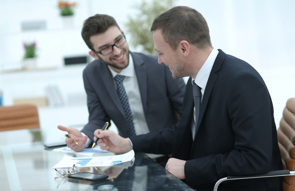 happy client speaking with an employee