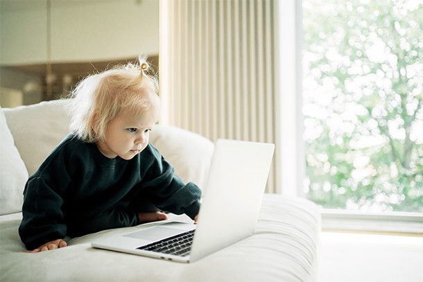 Young child using a laptop