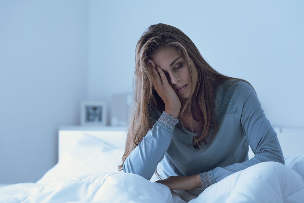 woman feeling sick