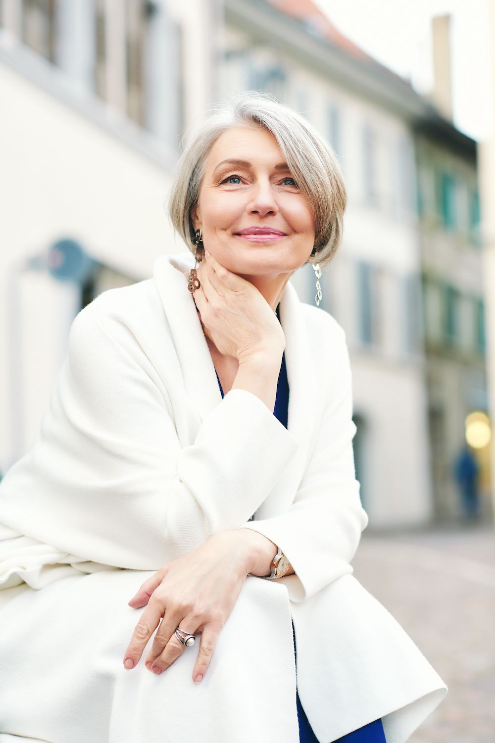 older woman in white