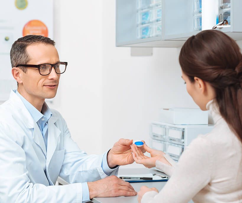 woman in a contact lens exam