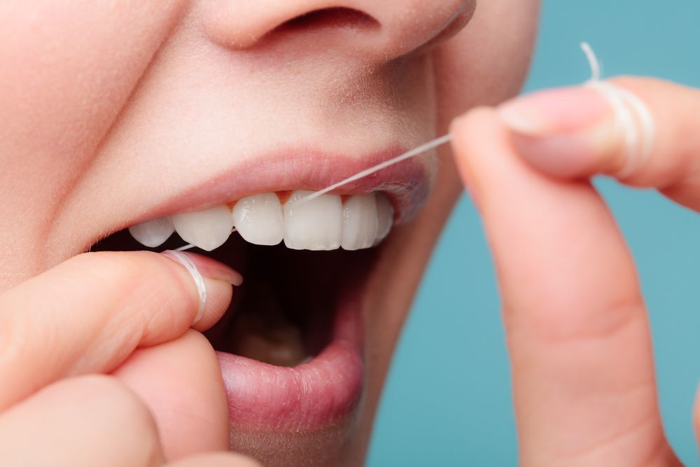 Proper Flossing Techniques for Effective Plaque Removal