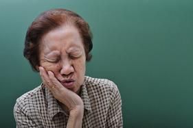 Old women with a toothache