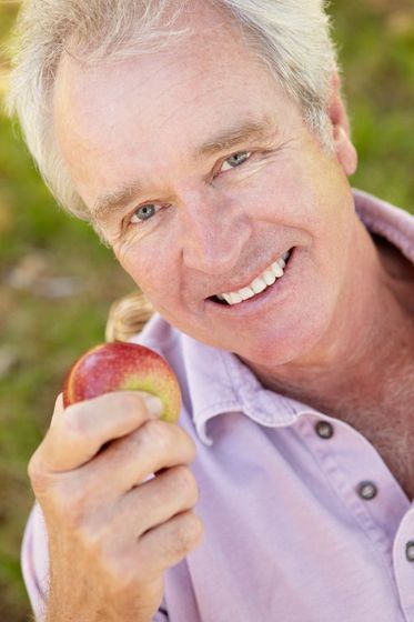 man with an apple