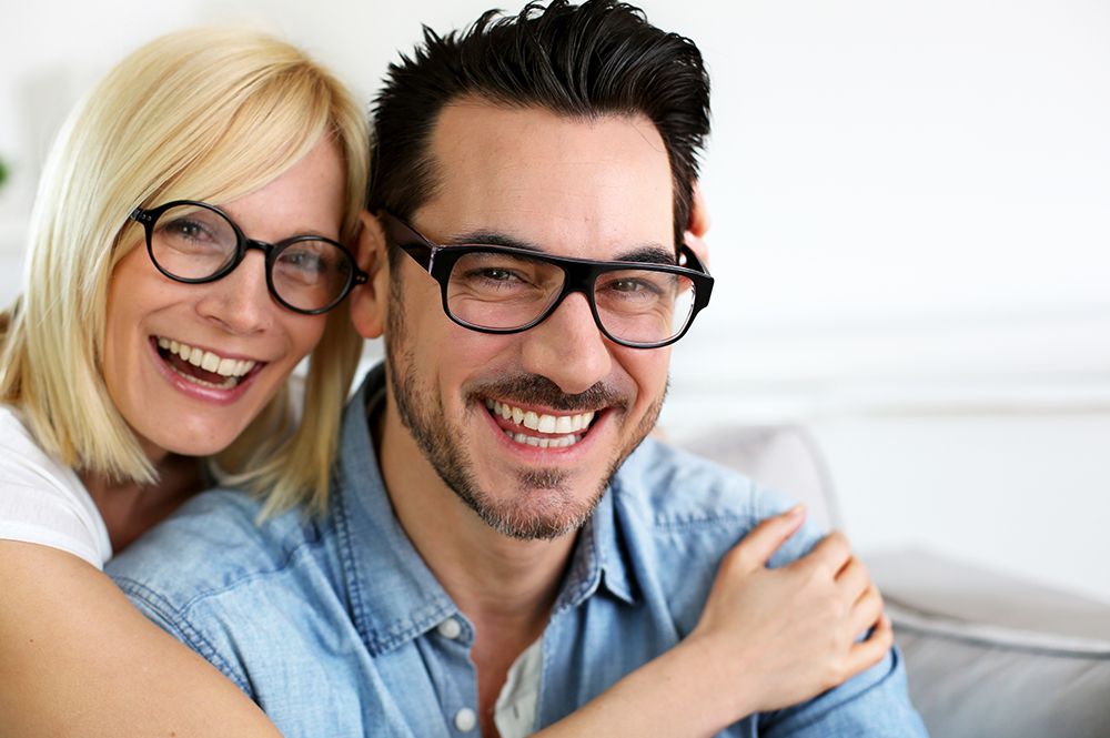 Happy couple wearing VeraBradly glasses