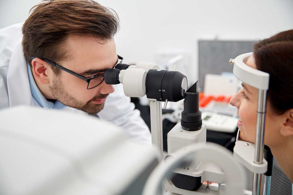 eye doctor with patient