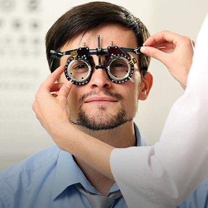 Male patient gets eye examination