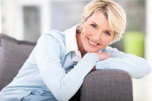 smiling woman in couch