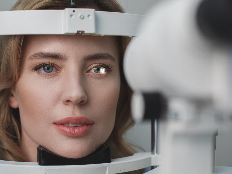 Woman gets her eyes checked