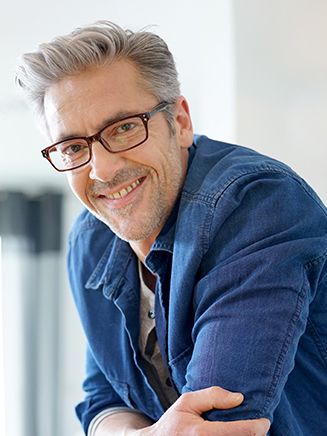 smiling man with eyeglasses