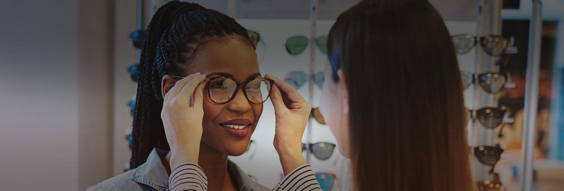 woman fitted for eyeglasses