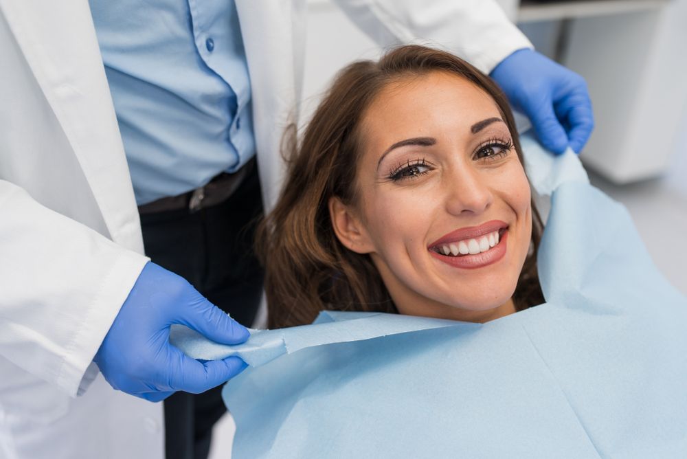 Smile Makeovers with Porcelain Veneers and Crowns