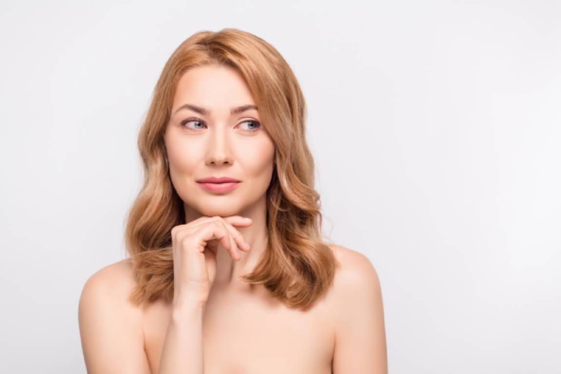 woman smiling with filler 