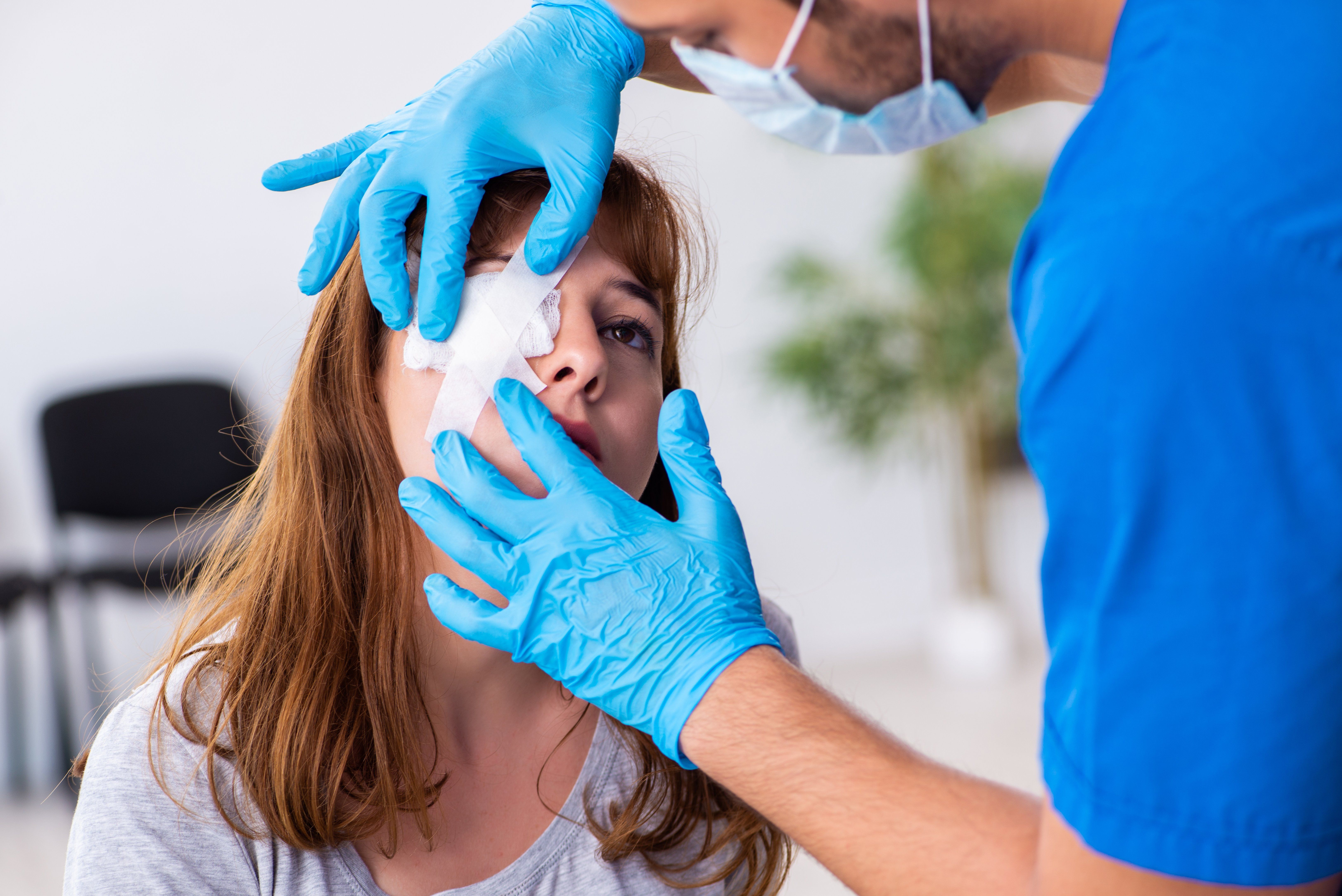 woman getting eye patch due to eye injury 