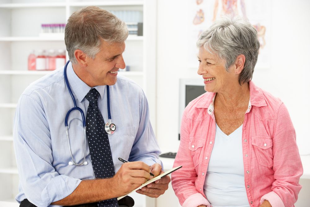 happy patient with eye doctor