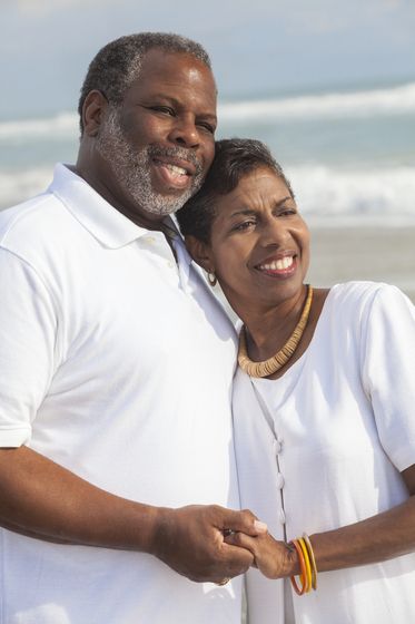 couple smiling at the beach
