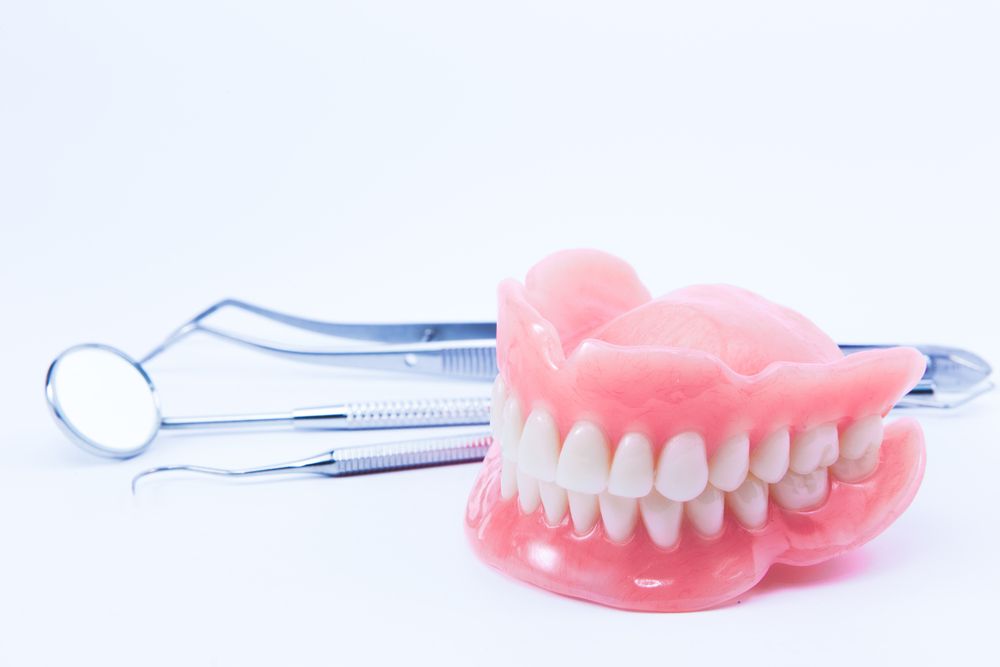 Dental Implants vs. Dentures