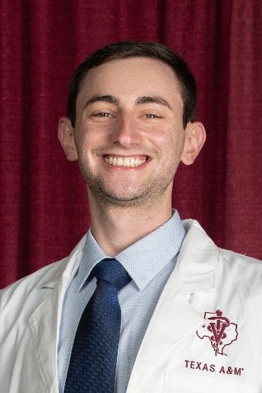 A person smiling for the camera