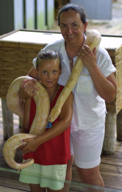 David and Amy holding a Python