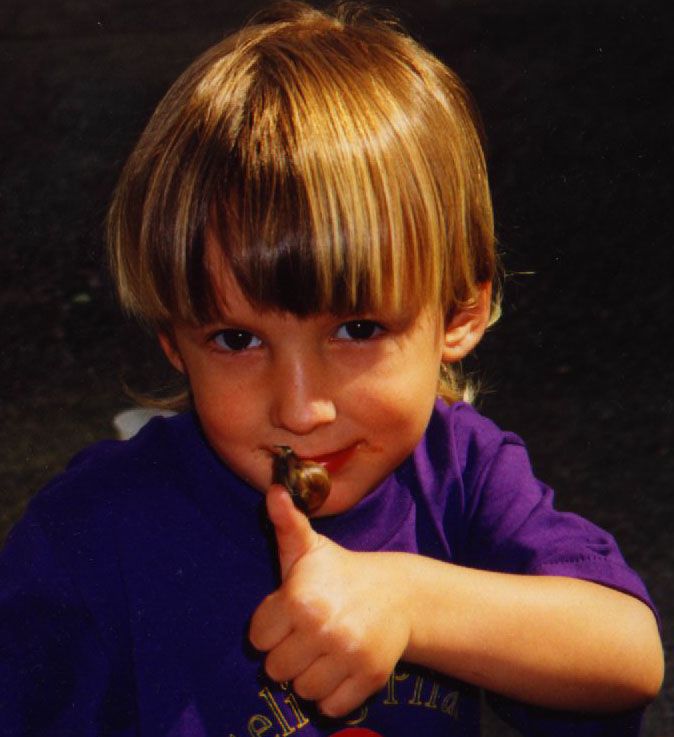 David holding a snail