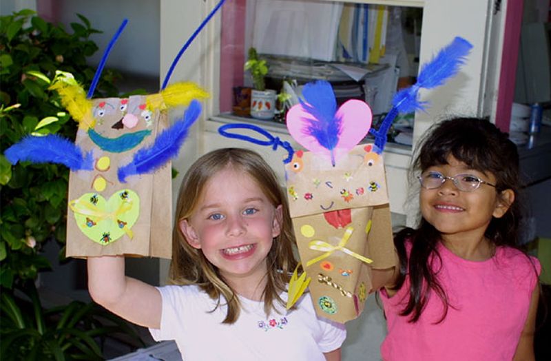 Rachel and Elizabeth modelling their bag puppets